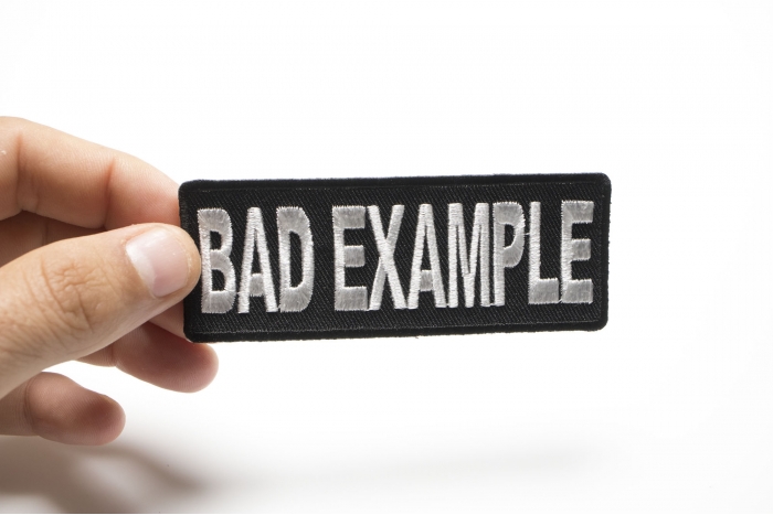 Bad Example Patch, Saying Patches shown on hand for size comparison