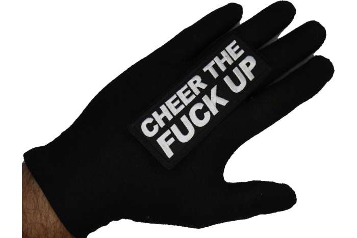 Cheer The Fuck Up Patch shown on hand for size comparison