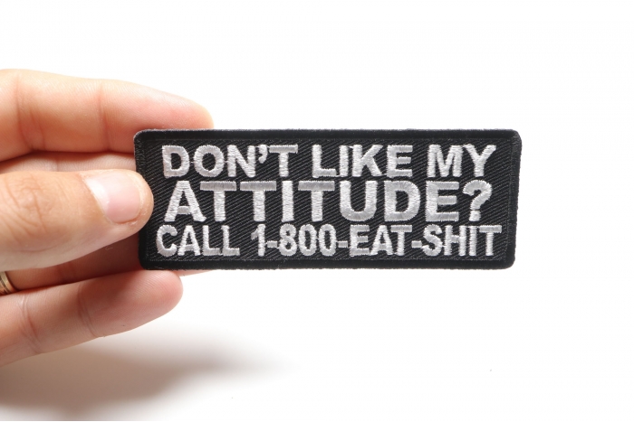 Don't Like My Attitude Call 1 800 Eat Shit Naughty Patch shown on hand for size comparison
