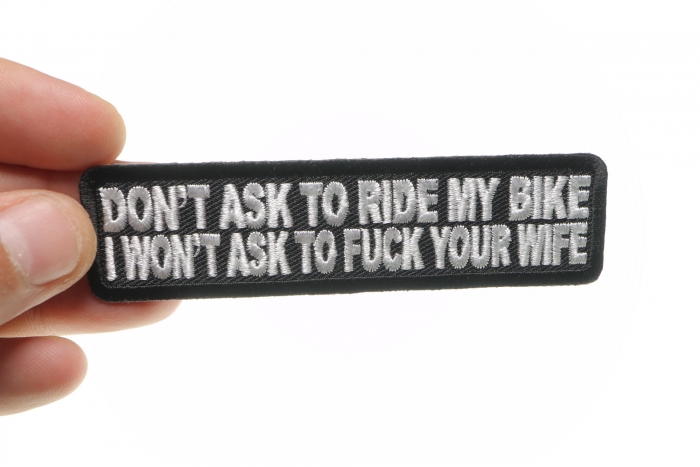 Don't Ask To Ride My Bike I Won't Ask To Fuck Your Wife Patch, Funny Patches for Adults shown on hand for size comparison