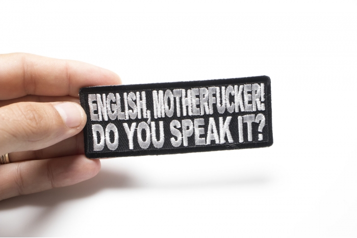 English Motherfucker You Speak It Naughty Iron on Patch shown on hand for size comparison