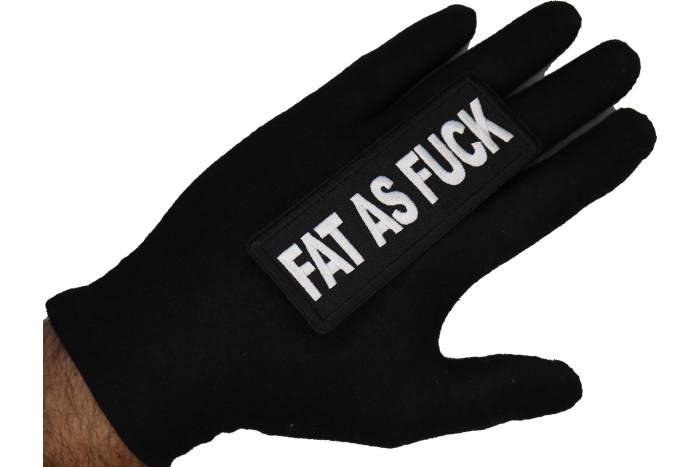 Fat As Fuck Patch shown on hand for size comparison