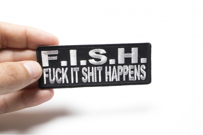 Fish Fuck It Shit Happens Naughty Iron on Patch shown on hand for size comparison