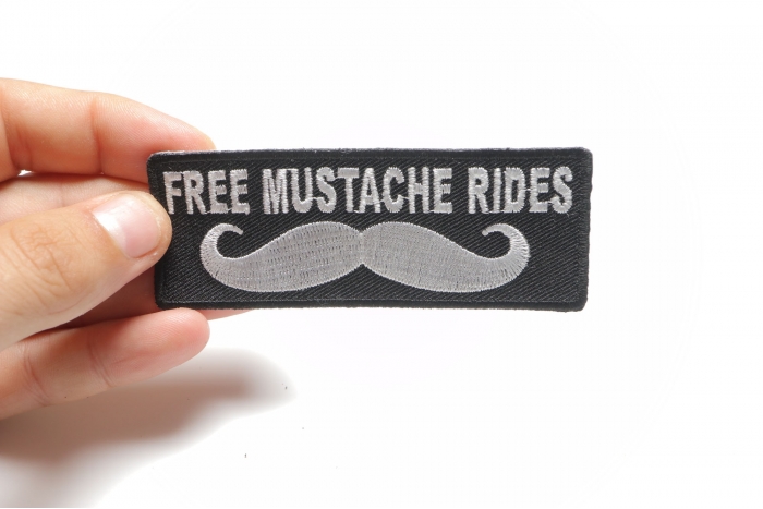 Free Mustache Rides Patch, Funny Patches for Adults shown on hand for size comparison