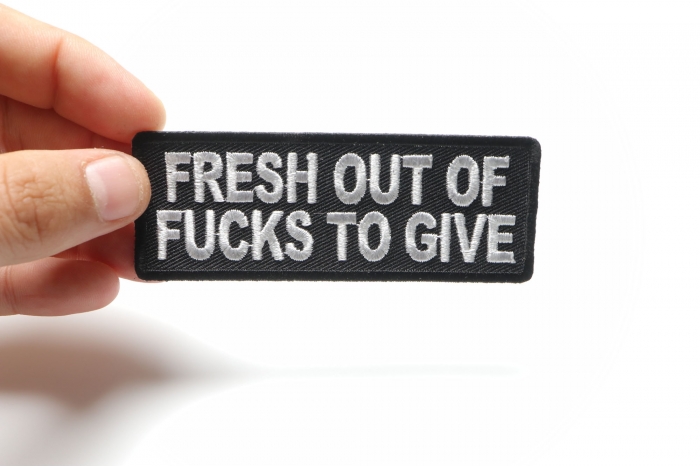 Fresh Out Of Fucks To Give Patch, Funny Saying Patches shown on hand for size comparison