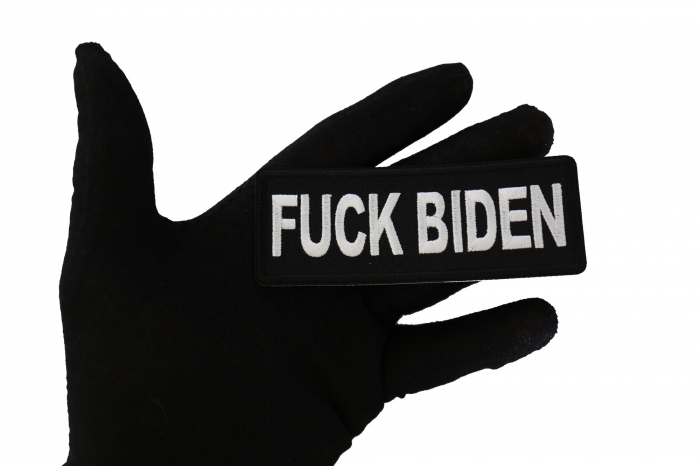 Fuck Biden Patch shown on hand for size comparison