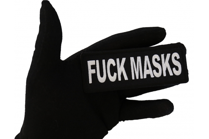 Fuck Masks Patch shown on hand for size comparison