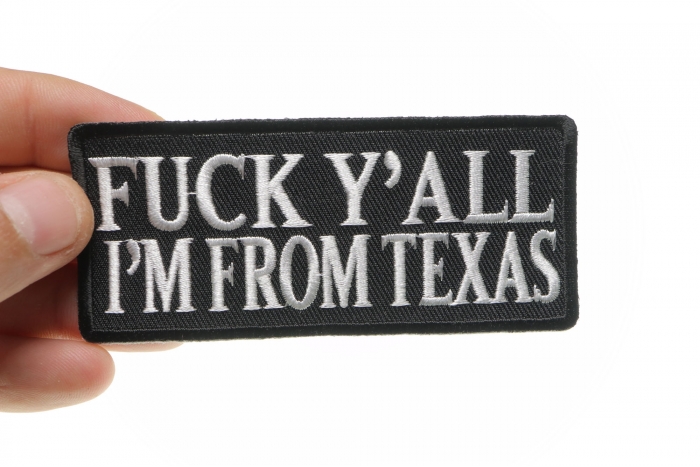 Fuck Y'All I'm From Texas Naughty Iron on Patch shown on hand for size comparison