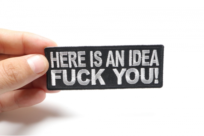 Here Is An Idea Fuck You Naughty Iron on Patch shown on hand for size comparison