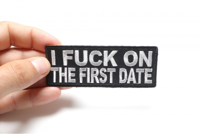 I Fuck On The First Date Naughty Iron on Patch shown on hand for size comparison