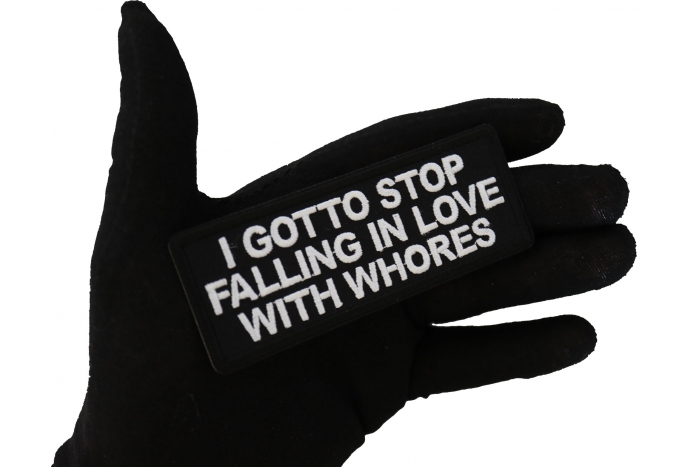 I gotto Stop Falling in Love with Whores Patch, Funny Saying Patches shown on hand for size comparison
