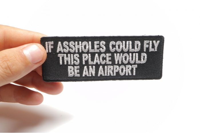 If Assholes Could Fly This Place Would Be An Airport Funny Patch shown on hand for size comparison