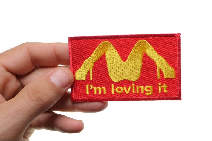 I'm Loving It Patch shown on hand for size comparison