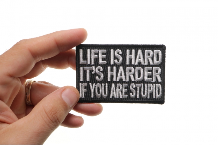Life Is Hard It's Harder If You'Re Stupid Patch shown on hand for size comparison