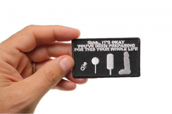 Lollipops To Cocks Patch shown on hand for size comparison