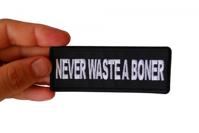 Never Waste a Boner Patch shown on hand for size comparison