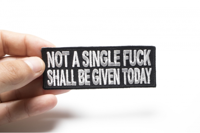 Not A Single Fuck Shall Be Given Today Patch shown on hand for size comparison