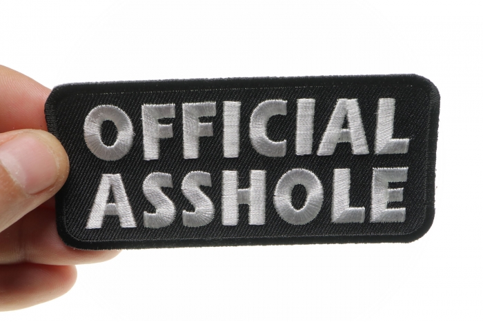 Official Asshole Patch, Funny Patches for Adults shown on hand for size comparison