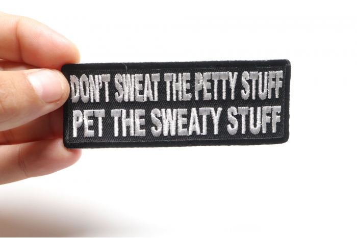 Pet The Sweaty Stuff Patch shown on hand for size comparison