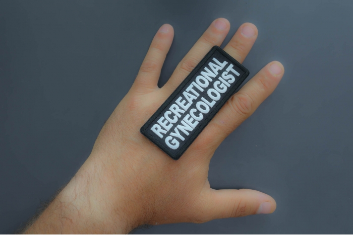 Recreational Gynecologist Patch shown on hand for size comparison