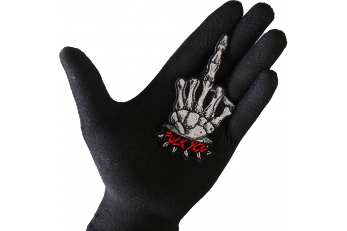 Skeleton Fuck You Middle Finger Patch shown on hand for size comparison