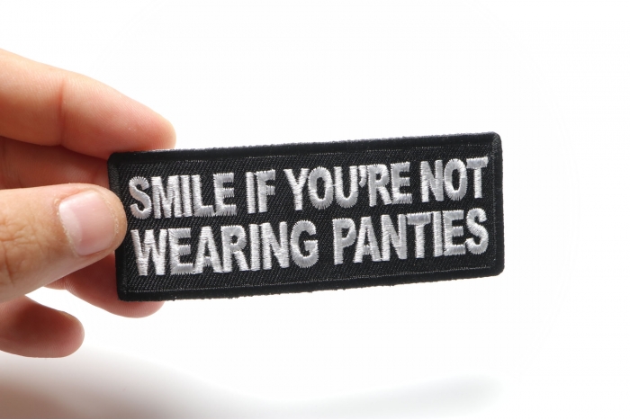Smile If You're Not Wearing Panties Patch, Funny Saying Patches shown on hand for size comparison