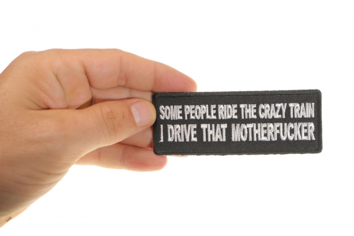 Some People Ride The Crazy Train I drive that Motherfucker Patch, Funny Saying Patches shown on hand for size comparison