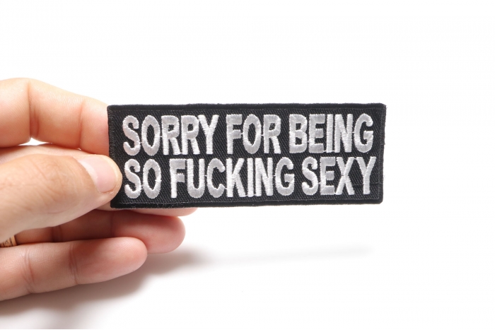 Sorry For Being So Fucking Sexy Patch shown on hand for size comparison