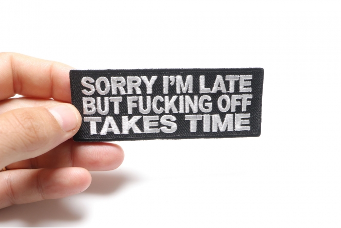 Sorry I'm Late But Fucking Off Takes Time Patch shown on hand for size comparison
