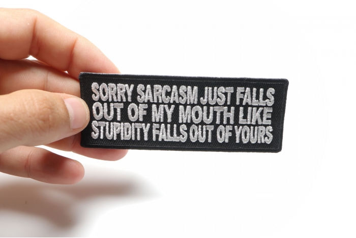 Sorry Sarcasm Just Falls Out Of My Mouth Patch shown on hand for size comparison