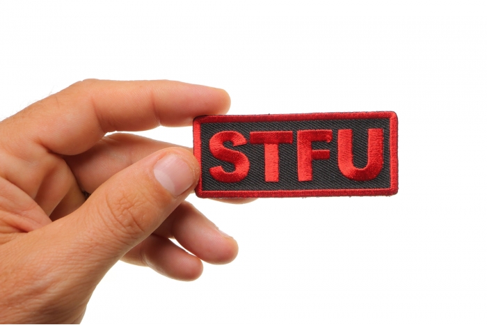 Stfu Patch shown on hand for size comparison
