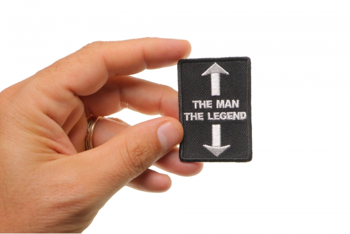 The Man The Legend Patch shown on hand for size comparison