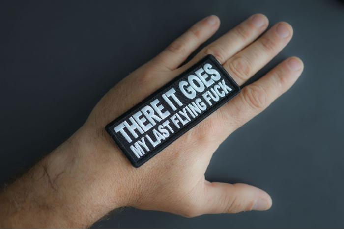 There It Goes My Last Flying Fuck Patch shown on hand for size comparison