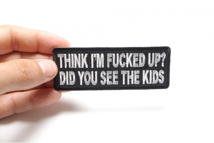 Think I'm Fucked Up? Did You See The Kids Funny Iron on Patch shown on hand for size comparison