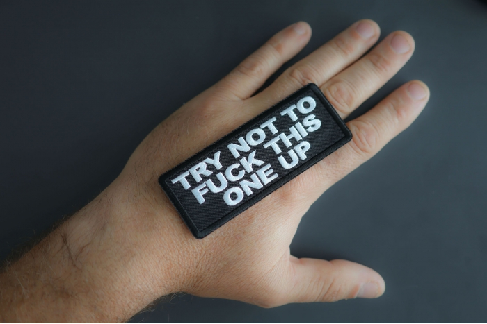 Try Not To Fuck This One Up Patch shown on hand for size comparison