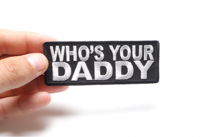Who Is Your Daddy Funny Iron on Patch shown on hand for size comparison