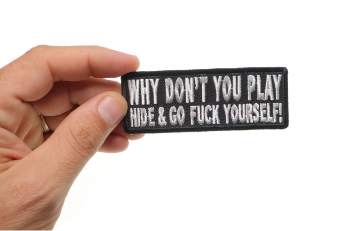 Why Don't You Hide and Go Fuck Yourself Funny Iron on Patch shown on hand for size comparison