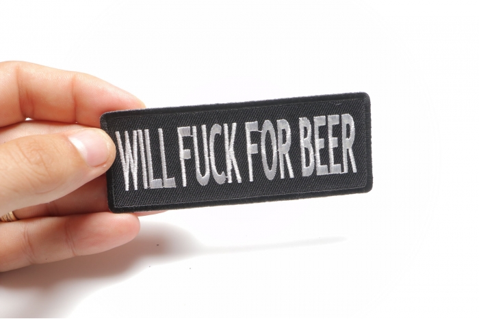 Will Fuck For Beer Funny Iron on Patch shown on hand for size comparison