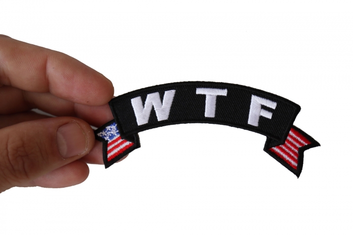 WTF Patch, Funny Patches for Adults shown on hand for size comparison