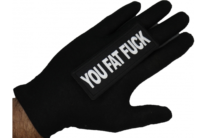 You Fat Fuck Patch shown on hand for size comparison