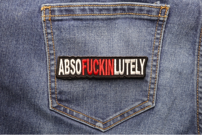 Absofuckinlutely Patch shown on jeans