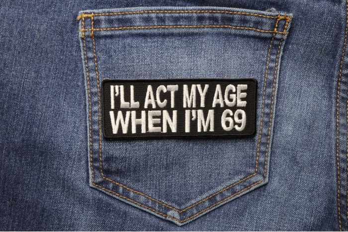 I'll Act My Age When I'm 69 Funny Naughty Iron on Patch shown on jeans