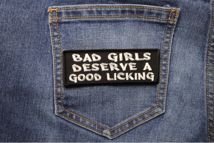 Bad Girls Deserve a Good Licking Naughty Patch shown on jeans
