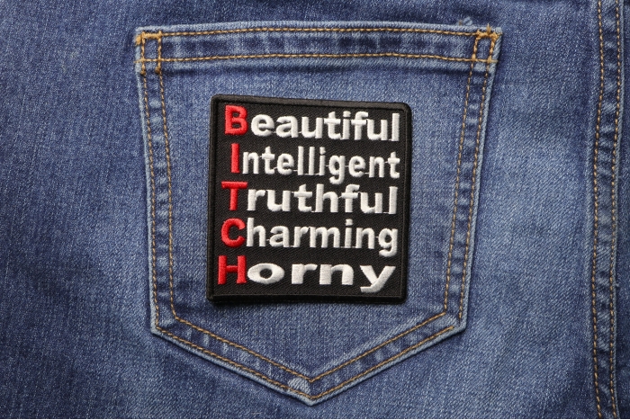 Beautiful Intelligent Truthful Charming Horny Bitch Naughty Patch shown on jeans