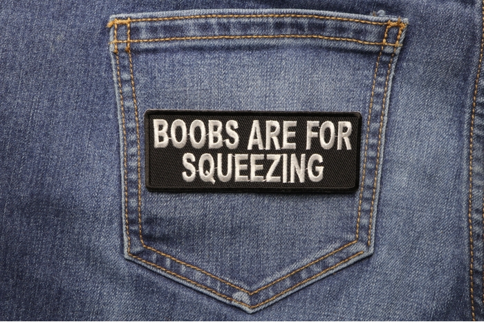 Boobs Are For Squeezing Fun Naughty Patch shown on jeans