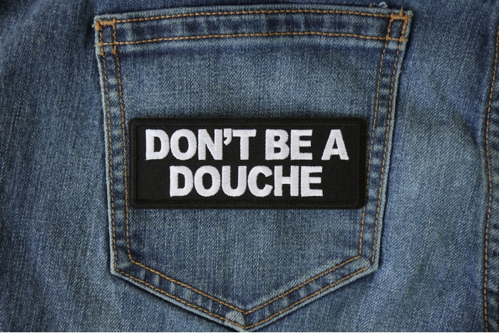 Don't Be a Douche Patch shown on jeans