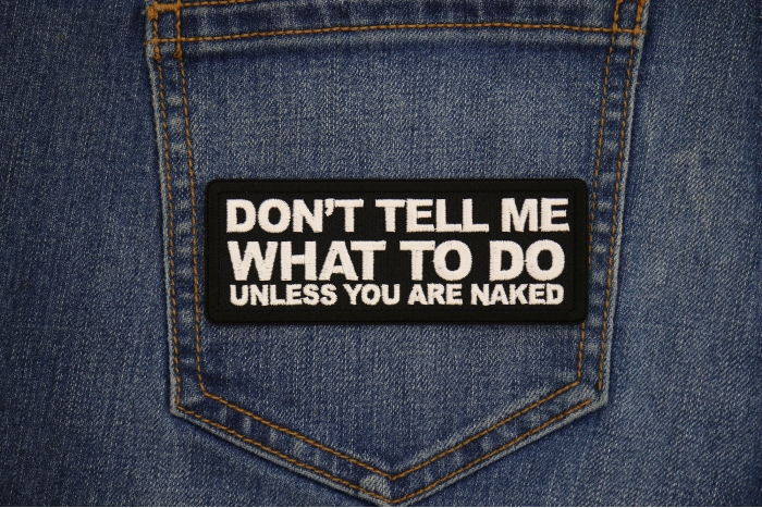 Don't tell me what to do unless you are Naked Patch shown on jeans