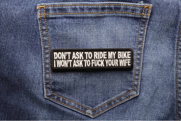 Don't Ask To Ride My Bike I Won't Ask To Fuck Your Wife Patch shown on jeans
