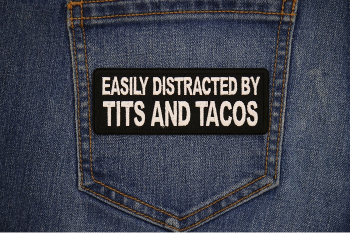 Easily Distracted by Tits and Tacos Patch shown on jeans