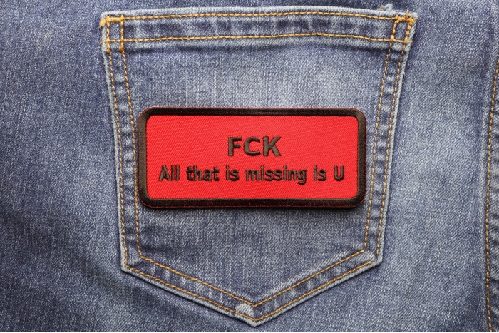 Fck All That Is Missing Is U Patch shown on jeans